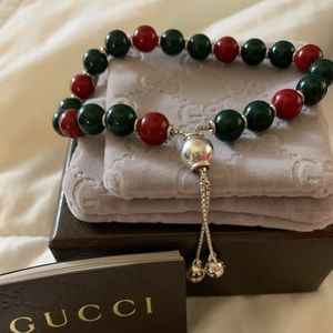 Gucci bracelet with wooden red and green beads